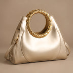 Leontine Women's Twisted-Handle Leather Handbag - Gold - Women's Accessories > Bags > Convertible Handbags - Eric Muller - Image 1
