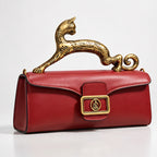Orlena Women's Structured Croc-Effect Handbag with Brass Leopard Handle - Wine Red - Accessories > Handbags > Top Handle Bags - Eric Muller - Image 1