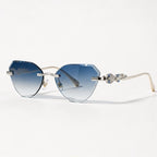 Seraphine Rimless Cat-Eye Shades - Sapphire - Sunglasses - Eric Muller - Image 1